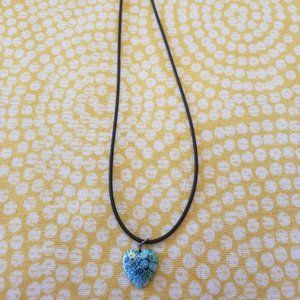 Blue heart necklace bought in Italy